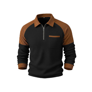 Polo de punto gofrado con media cremallera para hombre Haggar, negro y marrón, con cuello y bolsillo, diseño antipilling, estilo casual - Product Image 1