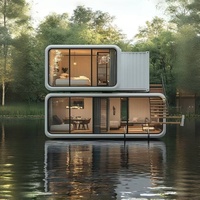 Cabines de bureau mobiles préfabriquées modernes de 20 pieds et 40 pieds, panneaux sandwich en acier, mini-maisons, chambre, salle de bain, cuisine pour villa, école