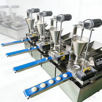 Machine automatique Momo pour le moulage de kubba, la fabrication de mooncakes, de mochi, de khinkali, de maamoul et de pains fourrés cuits à la vapeur