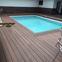 Planches de terrasse composites en bois et plastique respectueuses de la peau Revêtement de sol gaufré 3d Carrelages de sol imperméables pour balcon