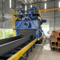 Machine de sablage à convoyeur à rouleaux série Zhiling Q69 (sablageuse) pour le nettoyage des profilés en acier, poutres en H, poutres en I et tôles d'acier