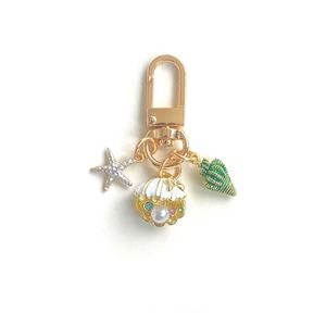 New OCean Little Pearl <b>Shell</b> Starfish Conch Keychain Holder Accessories Simple Mini Bag Pendant Keychain - Product Image 4