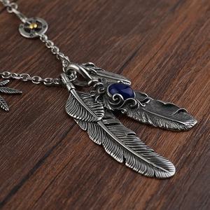 Ensemble de bijoux en acier inoxydable pour hommes, colliers rétro très tendance, colliers à pendentif plume pour hommes, accessoires de bijoux - Product Image 1