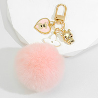Porte-clés mignons avec pompons, porte-clés boule rose, chaînes perlées, sangles, pendentif trèfle à quatre feuilles, breloque ours pour téléphone, porte-clés moelleux