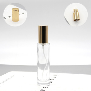 Flacons en verre cylindriques fins de 30 ml, fond épais, flacon de parfum avec pompe pulvérisatrice dorée/argentée - Product Image 2