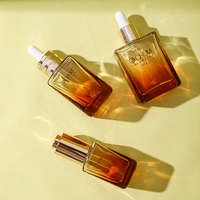 Yeni tasarım düz omuz 30ml 50ml 100ml yarı saydam kozmetik cam damlalık Serum yağ şişesi