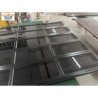 Portes de garage sectionnelles en aluminium 16x7 résidentielles transparentes en verre miroir noir à ouverture électrique étanche