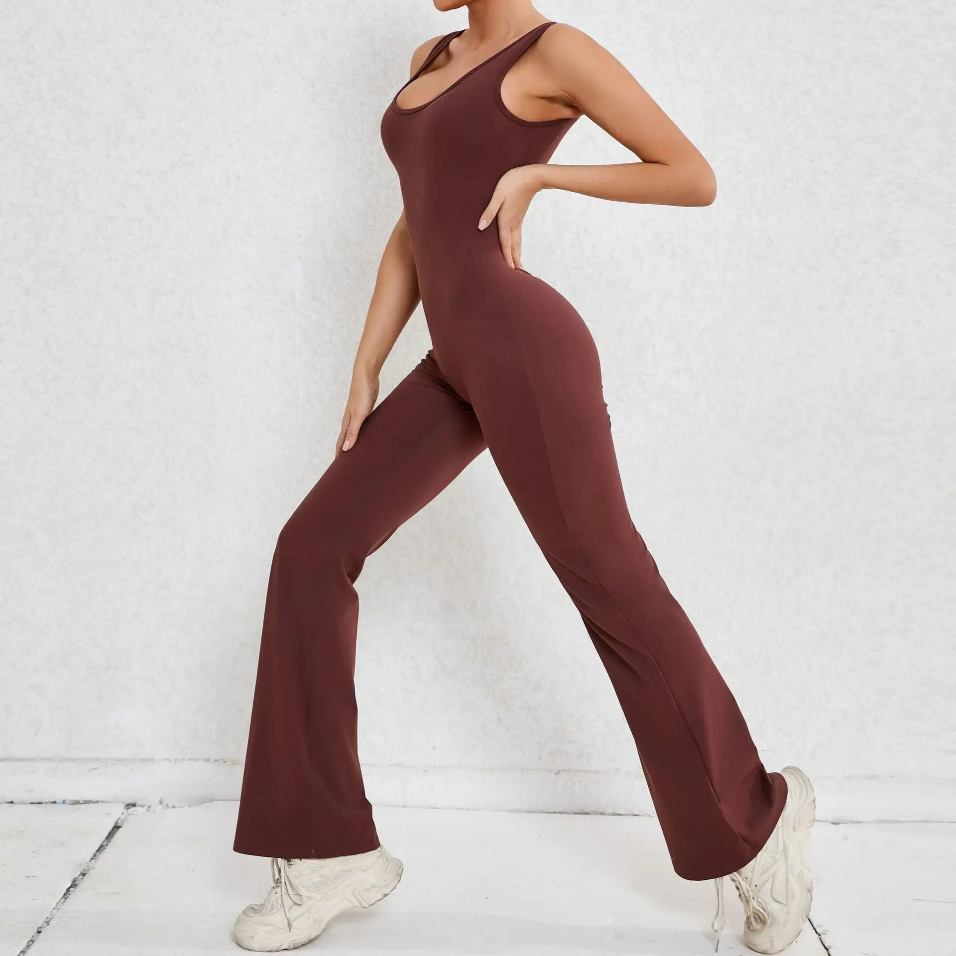 Damen 8-Farben XS-XL klassische lange ausgestellte Leggins Tanz-Jumpsuit sexy Rücken hohle Scrunch-Butt Yoga-Jumpsuit 2024