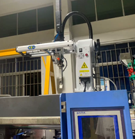 Manipulateur pneumatique automatique à bras oscillant pour machine de moulage par injection, pour la manipulation et le ramassage de produits en plastique