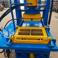 Ligne de production automatique de briques en plastique, machine de formage de blocs en poudre de plastique et de ciment pour les usines de matériaux de construction