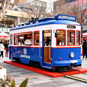 Camion de restauration rétro bleu en forme de tramway avec rails simulés pour la vente de snacks - Product Image 1