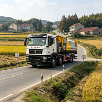 Camion de transport de déchets de construction et de déchets urbains SITRAK G5 8x4 à bras de ramassage manuel haute résistance pour projets d'ingénierie et exportation