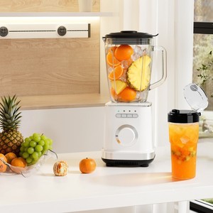 Licuadora de alta velocidad Outrip de 1.75L y 1300W con triturador de hielo y vaso de viaje para uso en la cocina - Product Image 1