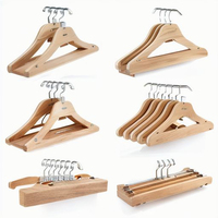 Service personnalisé vente en gros d'un cintre en bois de lotus de couleur naturelle de qualité