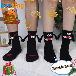 Ehanking lindo regalo de Navidad calcetines magnéticos para pareja divertidos ojos de dibujos animados creativos Mano a Mano medias de algodón puro - Product Image 1