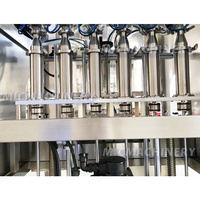 Volledig Automatische PLC 220V Lineaire Zuiger Honing Hete Chili Saus Pinda Boter Fles Ketchup Afvulmachine 2000BPH Hoge Nauwkeurigheid