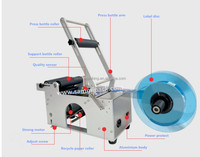 Étiqueteuse semi-automatique MT-50 de bouteille ronde, machine à étiquettes pour des canettes et des bouteilles de boisson