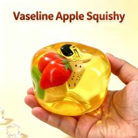 Jouet anti-stress en forme de pomme, coque transparente en TPR, rempli d'huile de coco avec des tranches de fruits flottantes, jouet sensoriel pour enfants