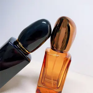 Haut de gamme 30ML clair rond verre parfum vaporisateur bouteille sous-bouteille presse pour voyage cosmétiques en gros emballage de remplacement