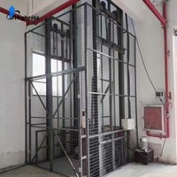 China Factory Hydraulischer Doppelführungsschienen-Hebebühnen aufzug für Lager