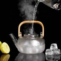 Vente en gros infuseur en verre à thé parfumé chinois théières bouilloires en verre avec manche en bambou