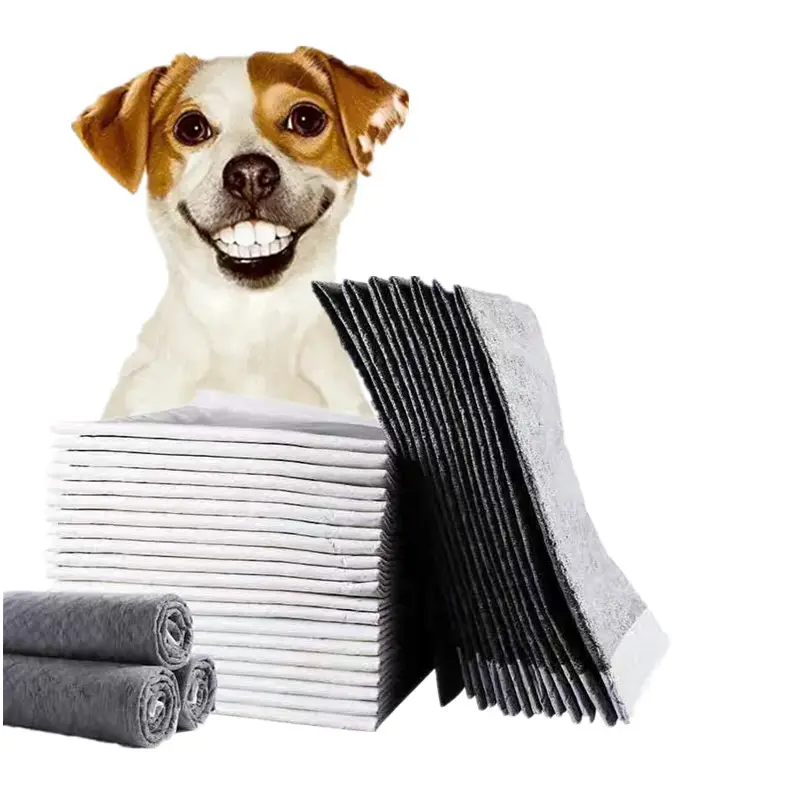 Vente en gros de tapis et coussinets de pipi pour chiots Pet Feuilles absorbantes d'urine jetables noires pour animaux domestiques