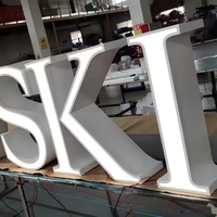 Lettres lumineuses Halo, lettres en acrylique rétroéclairées, lettres en acier inoxydable avec bordure en acier inoxydable, lettres 3D personnalisées pour enseigne murale de marque