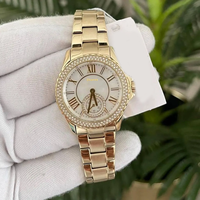 Montre de luxe pour femme MKOriginals en nacre, avec lunette en cristal festonné, sous-cadran, boîtier serti de diamants, étanche, chronographe doré