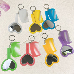 พวงกุญแจหวีกระจกทรงหัวใจน่ารัก 2 in 1 หวีแต่งหน้าขนาดพกพาจิ๋ว พร้อมจี้ห้อยกระเป๋าสำหรับสาวๆ ผู้หญิง ของขวัญ - Product Image 2