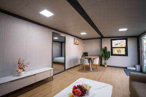 Casa contenedor prefabricada <span class=keywords><strong>de</strong></span> acero con paneles sándwich <span class=keywords><strong>de</strong></span> 20 pies, resistente al viento y con aislamiento térmico, ideal como casa pequeña para vacaciones familiares. - Product Image 4