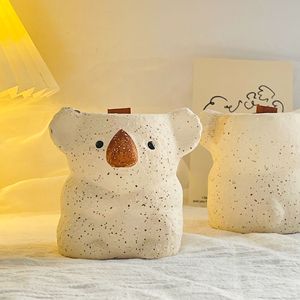 Velas hechas a mano de cera de lujo de cerámica de Koala lindo superventas en tarro de cerámica velas aromáticas mechas de madera <span class=keywords><strong>vela</strong></span> perfumada - Product Image 5