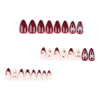 Ongles press-on réutilisables et imperméables – Style cercueil moyen French Manicure avec motif papillon et nœud