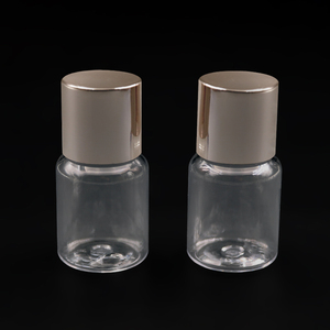 Luxuriöse kundenspezifische Plastikzylinder 15 ml Duftflasche Kosmetik Hautpflege leere Flaschen mit goldenem Spiralabdeckel - Product Image 1