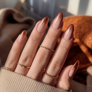 <span class=keywords><strong>Uñas</strong></span> <span class=keywords><strong>postizas</strong></span> de gel suave duraderas OEM ODM <span class=keywords><strong>con</strong></span> diseño de almendra, lujo, brillo marrón, impermeables, puntas francesas, a presión - Product Image 1