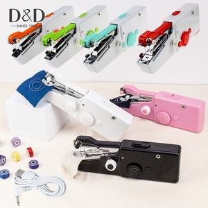 Machine à coudre portable mini domestique, rechargeable par USB, à une aiguille, avec transport par patin, nouvelle en plastique - Product Image 1