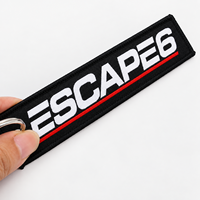 Porte-clés promotionnel en tissu, étiquette d'aviation personnalisée brodée avec logo sur bordure Merrow