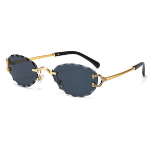 2025 nueva moda Oval <span class=keywords><strong>gafas</strong></span> sin montura hombres Uv400 <span class=keywords><strong>gafas</strong></span> de sol de lujo mujeres marcos de Metal de alta calidad logotipo propio personalizado - Product Image 1
