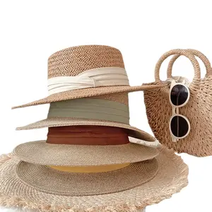 Strohhut Female Summer Seaside Flat Top Sonnencreme Sonnenhut Strand Fisherman Seaside Photo Straw Woven Fashion Hüte für Frauen