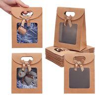 Sac cadeau en papier kraft écologique avec fenêtre, personnalisable avec logo, poignée découpée en forme de cœur, ruban et nœud, idéal pour les fêtes - Vente en gros