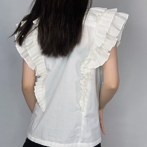 เสื้อผู้หญิง OEM แต่งระบายสีขาว ดีไซน์เสื้อเชิ้ตสีขาวแต่งระบายสุดหรู - Product Image 3