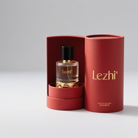 Boîte rigide de luxe personnalisée pour parfum avec logo estampé or, emballage de parfum indépendant en forme de baril rond mat avec EVA