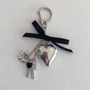 Estilo coreano diseño de nicho marco de fotos llavero de Metal plata amor arco bolsa colgante estilo Ins - Product Image 1