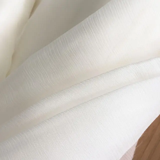 शुद्ध सफेद रेशम Crinkle Georgette रेशम क्रेप शिफॉन कपड़े के लिए कढ़ाई आइवरी में