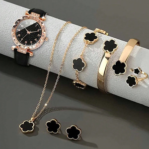 Orologio da Donna di Alta Qualità con Quadrante Nero Stellato e Set di Gioielli Quadrifoglio: Collana, Orecchini, Bracciale e Anello - Product Image 1