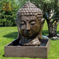 Grande fontaine d'eau en marbre personnalisée avec tête de bouddha Statue de bouddha de jardin en pierre noire naturelle
