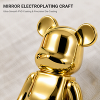Sculpture d'ours personnalisée en finition miroir métallique, art moderne pour la décoration de bureau