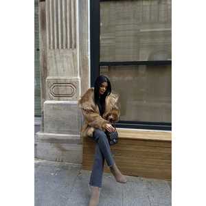 Manteaux pour femmes avec col en fausse fourrure jaune - Product Image 1