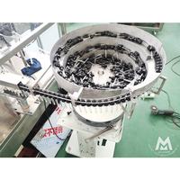 Machine automatique de remplissage et de bouchage de flacons compte-gouttes pour huiles essentielles