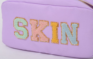 กระเป๋าเครื่องสำอางค์,กระเป๋าเครื่องสำอางสตรีปักลายตัวอักษรไลแลคผ้าไนล่อนอย่างหนาหลากสี - Product Image 4