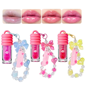 ลิปกลอสสีชมพูขายส่งพร้อมพวงกุญแจ  รับผลิตแบรนด์ส่วนตัว ลิปกลอสวีแกนเนื้อฉ่ำวาว DIY ลิปกลอสออยล์พร้อมพวงกุญแจพู่ห้อย - Product Image 1